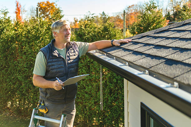 Professional Hail Damage Roof Repair technician working in Phoenix, MD